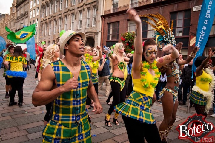 Brazilian dancers in Brazilian National Tartan wearing kilts, waistcoat, bermuda shorts and hats made in the Brazilian National Tartan.