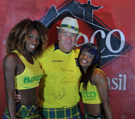 Alan Rough with Brazilian Tartan dancers outside Boteco do Brasil in Glasgow
